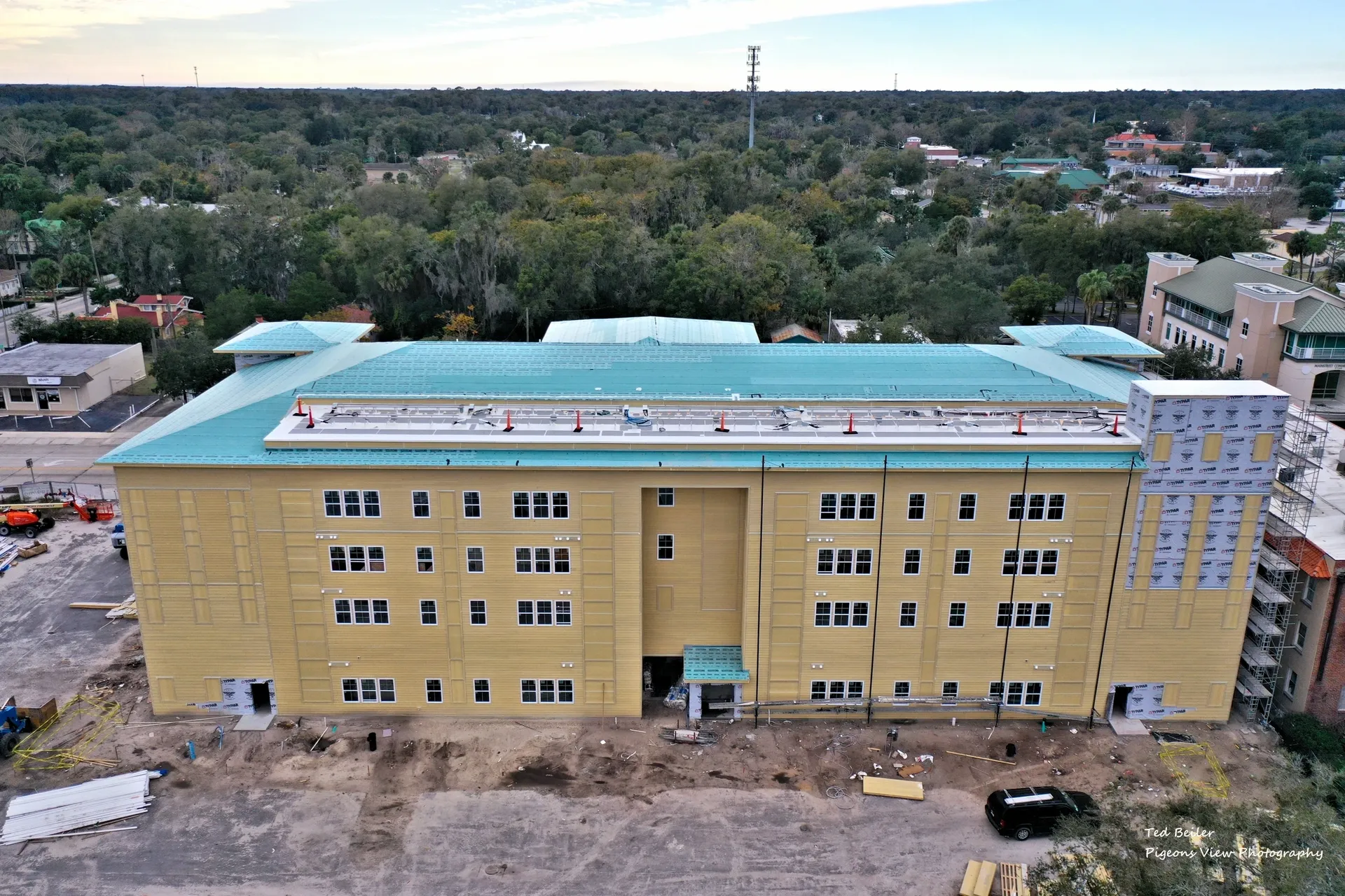 Aerial view of large yellow building