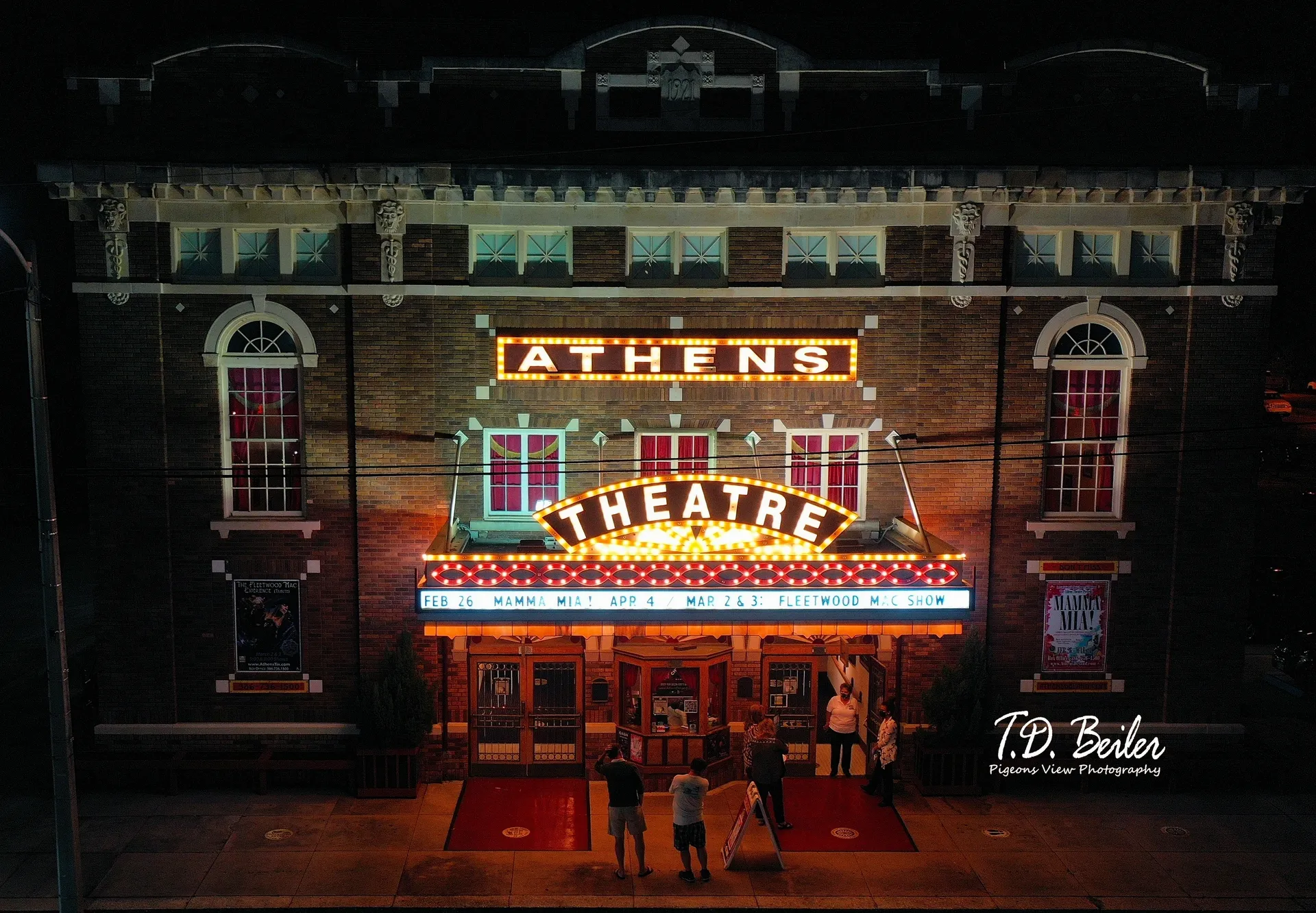 Historic theater illuminated at night