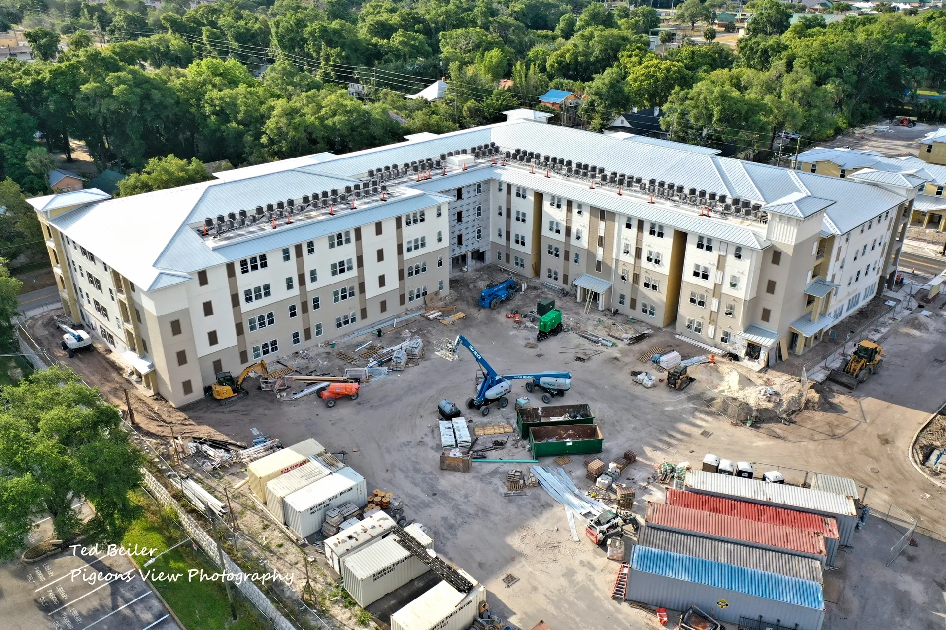 Construction site surrounded by trees