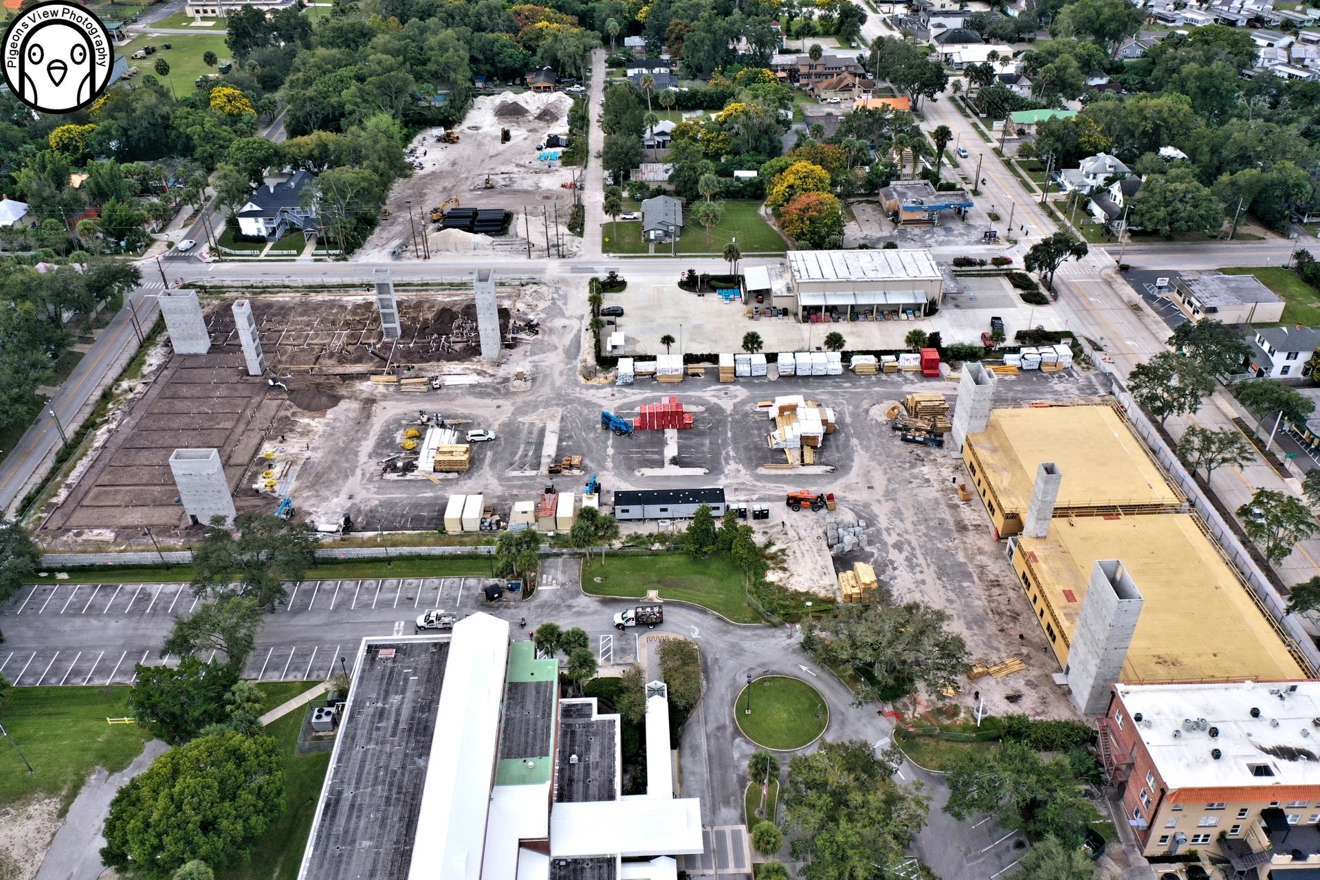 Building project surrounded by greenery