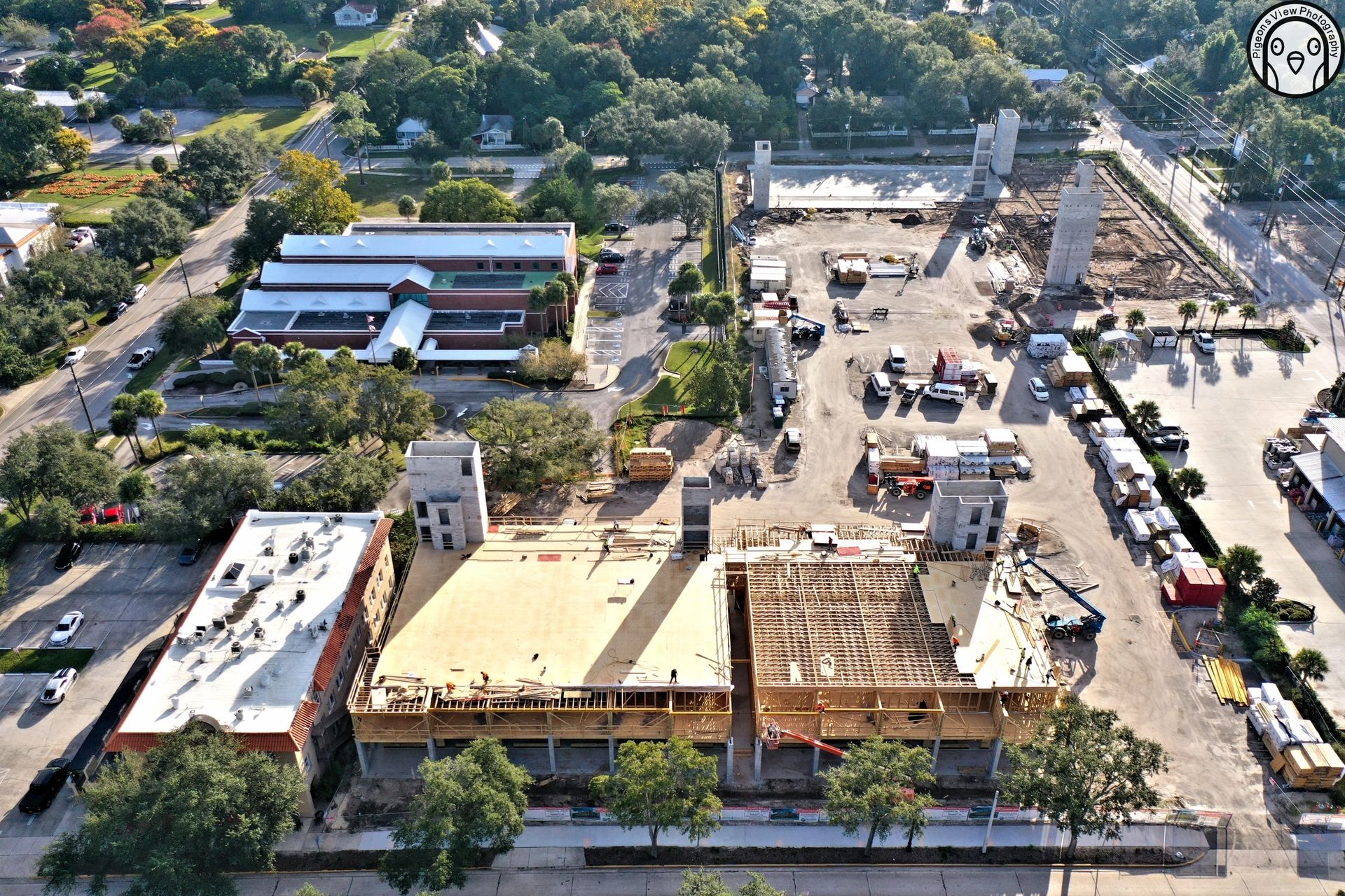 Building under construction with surrounding greenery